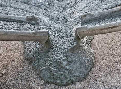 Aerial view of workers on concrete slab at construction site