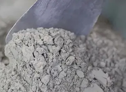 Close-up cement powder with scoop for OPC 33 grade product display